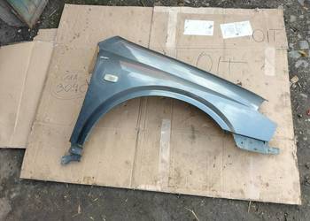 NISSAN PRIMERA P12 BŁOTNIK PRAWY PRZÓD