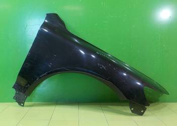 VW TOUAREG I LIFT 2.5 TDI 08r 5D blotnik prawy przod