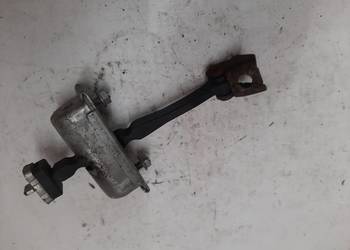 Opel Corsa D 5 D  Lewy Przedni ogranicznik drzwi