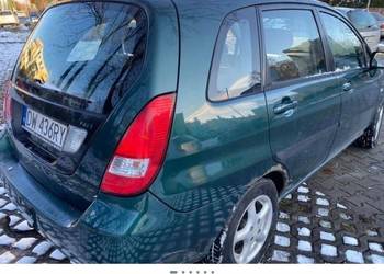 Szyba boczna drzwi karoseryjna Suzuki Liana 01-10 hatchback