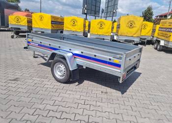 Przyczepa lekka marka Niewiadów skrzyni pod płytę 263x132 nowa resor amorty