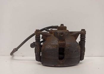 SKODA KAROQ ZACISK PRAWY PRZÓD 8V0615124