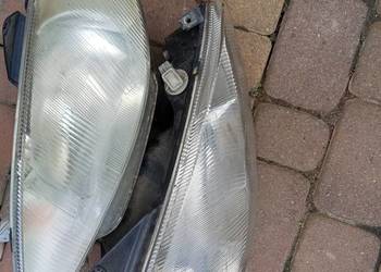 Lampy przód Peugot 206