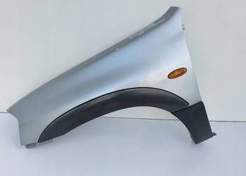 Mazda Tribute PRZEDNI BŁOTNIK LEWY PRZÓD 26A