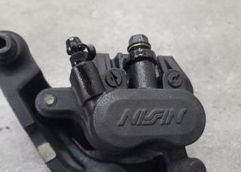 HONDA GOLDWING GOLD WING  GL1500 SC22 97 ZACISK TYŁ TYLNY NISSIN OEM