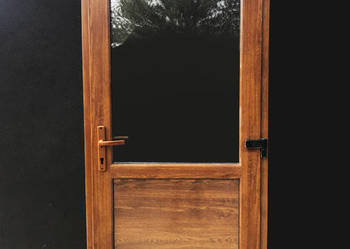 DRZWI PCV w kolorze złoty dąb szyba panel 100x200