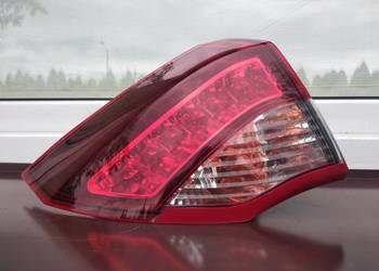 Renault Laguna 3 III liftback lampa tył tylna lewa w błotnik 265550001R