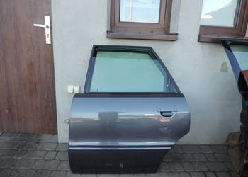 AUDI 80 B4 KOMBI AVANT DRZWI LEWY TYŁ