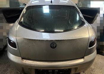 CZĘŚCI zderzak maska lampa błotnik wahacz zacisk Alfa Romeo GT kolor 694