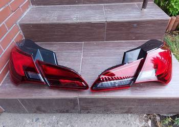 Lampy tylne tył NOWE ORYGINALNE Komplet 4szt. Opel Astra J IV 4 HB GTC