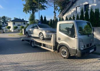 Transport pojazdów laweta pomoc drogowa holowanie