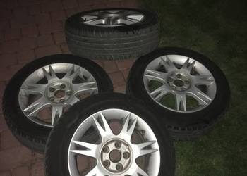 Alufelgi srebne z oponami 15 Calley