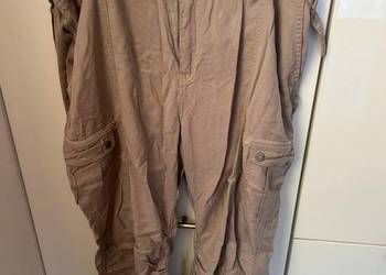 Beżowe spodnie z ciekawym krojem L