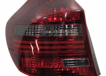 BMW 1 E87 5D 2007-2011 LIFT Lampa tylna lewa dymiona Valeo Uszkodzona