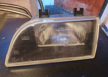 Lampa lewy przód FSO Polonez Caro Atu czarny środek NOWA