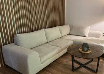 Kremowy narożnik z funkcją spania