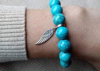 Bransoletka damska z Howlitu 10mm +skrzydełko srebrne (próby 925) Bransoletka damska z Howlitu 10mm +skrzydełko srebrne (próby 925)