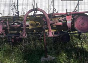 Przetrząsarko - zgrabiarka taśmowa