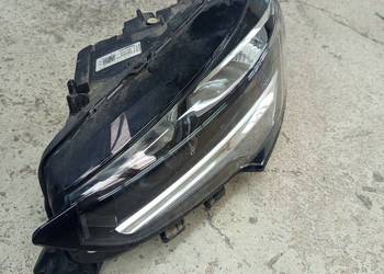 Reflektor lewy corsa f orginalny