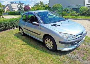 Peugeot 206 1 4 prawdopodobnie uszkodzona uszczelka pod głowicą.