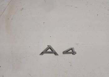 ZNACZEK EMBLEMAT KLAPY TYŁ AUDI A4 B7 ORYGINAŁ