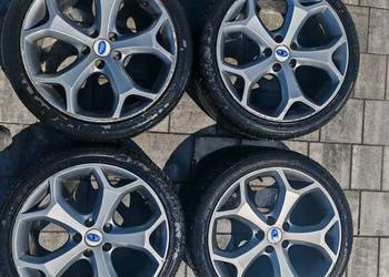 Cztery felgi do Forda ST z oponami R18 5x108 ET 45