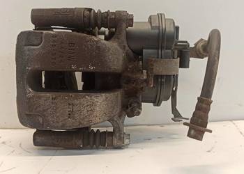 BMW 7 G11 ZACISK HAMULCOWY LEWY TYŁ 6870571