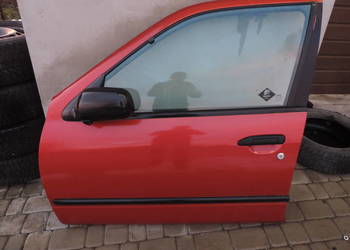 NISSAN PRIMERA P11 5D HB DRZWI LEWY PRZÓD