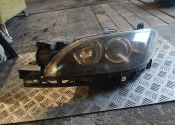 Lampa lewa przód przednia Mazda 3. I .BK.EU. 03-06r