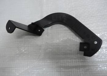 LEWY UCHWYT WSPORNIK HALOGENU OPEL CORSA D LIFT NOWY 13345360