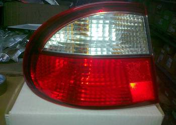 DAEWOO LANOS 4drz LAMPA TYŁ LE/PR  NA BŁOTNIK  NOWA