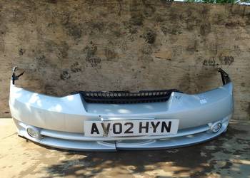 HYUNDAI COUPE II ZDERZAK PRZÓD HALOGEN  LS