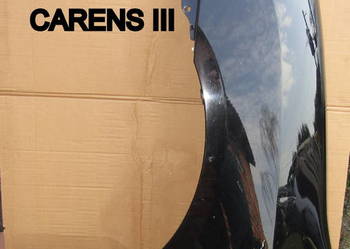 BŁOTNIK PRZEDNI LEWY KIA CARENS III 2007r CZARNY