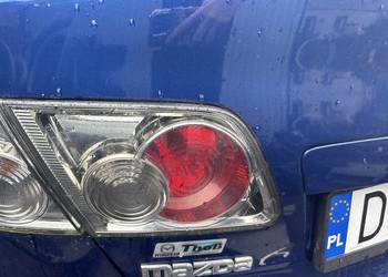 Lampa w klapie lewa  Mazda 6 I GG sedan
