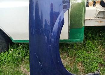 Błotnik prawy nissan almera n16 lift BW6G