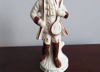 Porcelanowa figurka muzyk skrzypek antyk