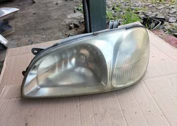 KIA CARNIVAL LAMPA PRZÓD LEWA