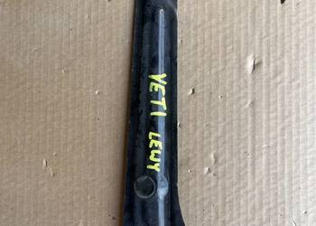 WSPORNIK UCHWYT WZMOCNIENIE PASA LAMPY LEWY PRZÓD SKODA YETI 5L0805931