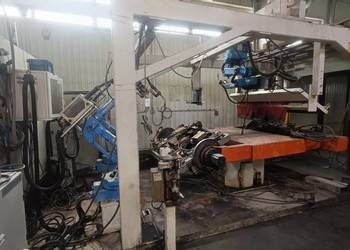 Cela spawalnicza z 3 robotami i stołem obrotowym