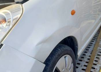 Błotnik Przedni Lewy Lak ZHJ Nissan Pixo 1.0b 2009r Wysyłka