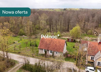 Stożne wiejski domek z drewutnią i ogrodem