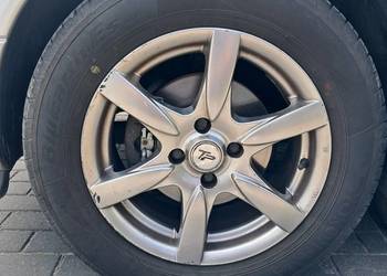 4 koła OPEL ASTRA G 15 cali 4x100 195/65R15 # PIASECZNO