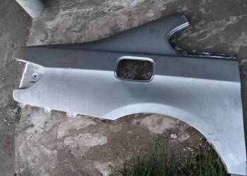 Blotnik  prawy tylny  bmw  cupe