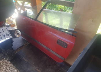 Opel Calibra drzwi lewe