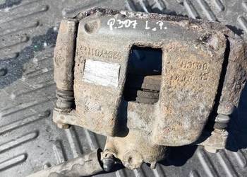Zacisk hamulcowy jarzmo przód lewy peugeot 307