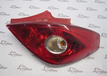 OPEL CORSA D lampa prawa tył 13211841 89038963A