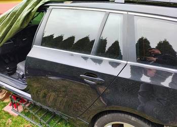 Drzwi lewy tył BMW E61 Black Saphir Metalic