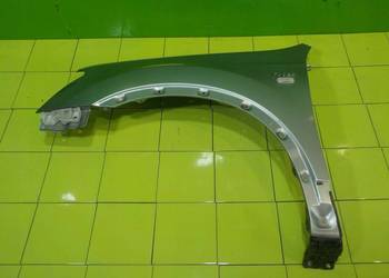 NISSAN QASHQAI J10 I +2 09r blotnik lewy przod