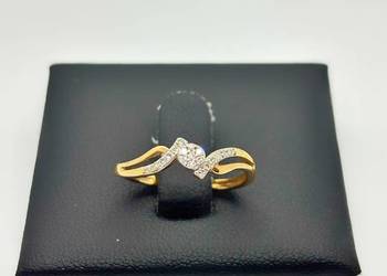 Złoty pierścionek pr 375 1,14g (Rozmiar 10) z diamentem.