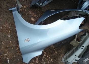 mazda 2 migacz przedni błotnika